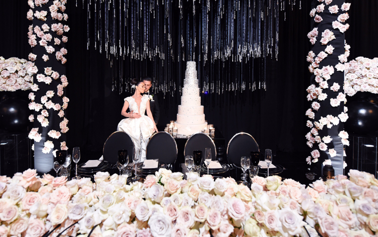 Elegant wedding cake table styled by Kat Minassi Events