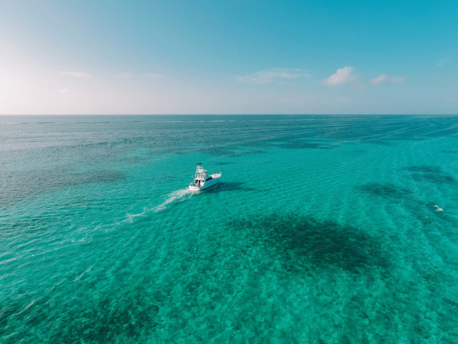 North vs South Ambergris Caye Real Estate Guide (2026 Update)
